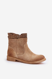 Valdera suede ankle boots with cutout detail, featuring flat heel, side zipper, and rounded toes, crafted for elegance and comfort.