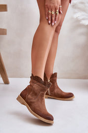 Valdera suede ankle boots with cutout detail, showcasing premium natural suede, side zipper, flat heel, and delicate openwork design.