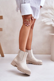 Woman wearing beige Myrella Platform-Laced Winter Boots with eco leather, block heel, and secure fit, styled for fall and winter.