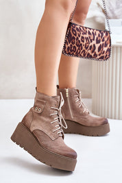 Tharvene Ridgewarm Sculpted Ease ankle boots with high wedge and side zipper, crafted from natural leather for warmth and style.
