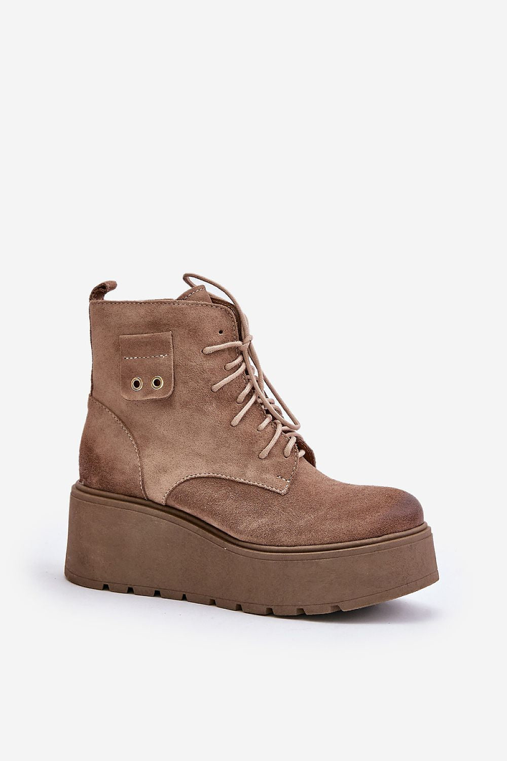 Tharvene Ridgewarm Sculpted Ease ankle boots with high wedge and grooved platform, showcasing natural leather and side zipper detail.