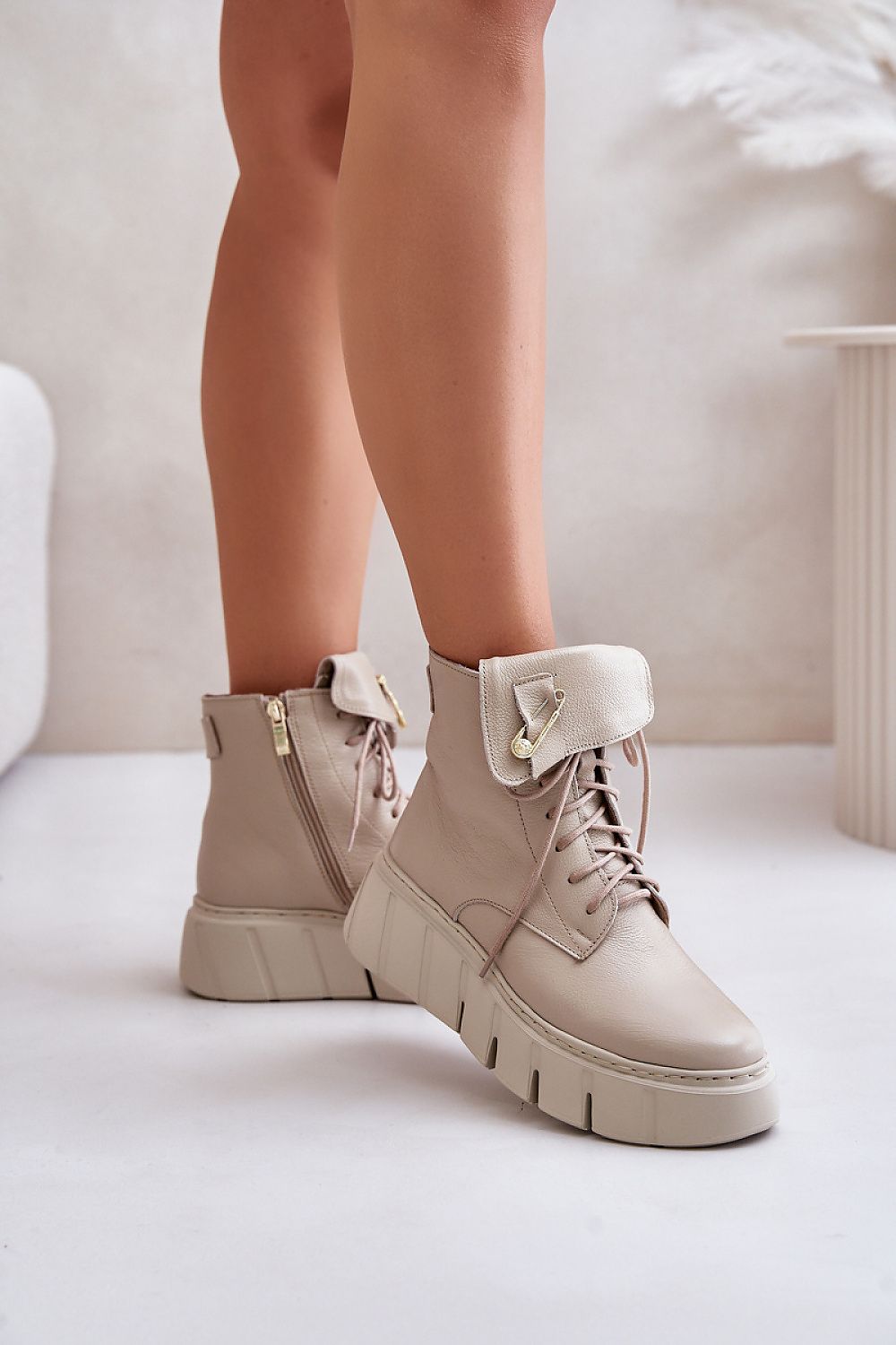 Beige Kaelith Leather Platform Boots with safety pin accent and side zipper