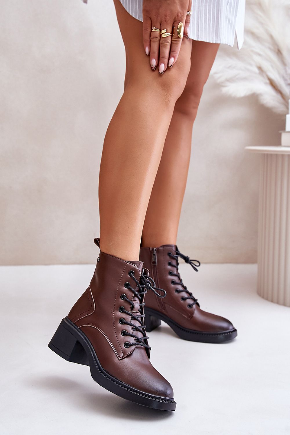 Milvera leather lace-up heel boots with block heel, showcasing elegance and comfort in an ankle-high silhouette, perfect for autumn.