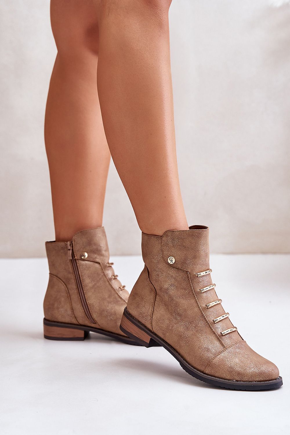 Norelle Minimal Zip Boots in eco leather with side zipper, flat heel, and rounded toes, perfect for warmth and comfort on cold days.