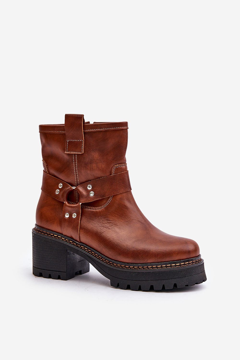 Brown leather platform heel boots with a rounded toe, side zipper, and decorative buckle, showcasing elegant and versatile design.