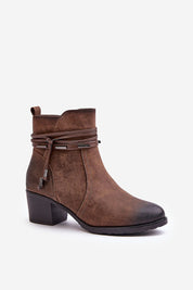 Brown eco-leather ankle boots with mid heel and side zipper, featuring decorative stripe and rounded toe, perfect for cool seasons.