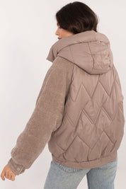 Back view of Velmora Quilted Hooded Jacket with corduroy sleeves and quilted body, showcasing casual urban style and comfort.