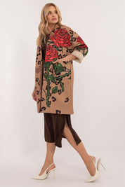 Florénne Rhinestone Rose Coat with red floral print and rhinestone accents, ideal for autumn layering; model wearing elegant apparel.