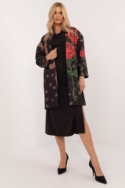 Alt Tag: Woman wearing Florénne Rhinestone Rose Coat with stemmed rose print and rhinestone accents, styled for elegance and comfort.