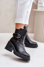 Velona heeled winter boots in black eco leather with a buckle strap, featuring post heels for stability, perfect for elegant winter style.