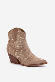 Solbrana Wildcrest eco-suede cowboy boots with block heel and artistic ornamentation, ideal for versatile and stylish outfits.