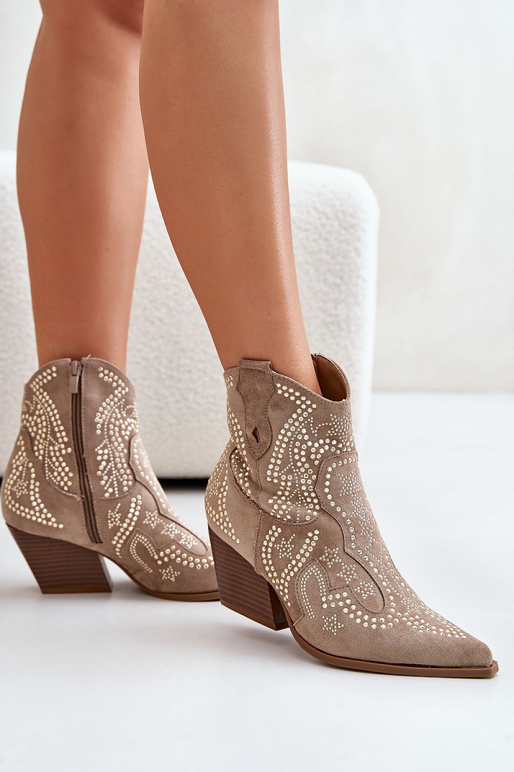 Solbrana Wildcrest suede heel boots with decorative flair and block heel in eco-friendly material, perfect for versatile styling.