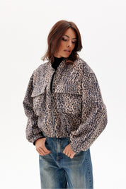Vionera Cropped Suede-Effect Jacket with animal pattern, featuring a relaxed cut and flap pockets for modern style and comfort.