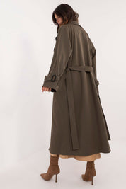 Back view of a woman wearing an Auremere Double-Breasted Trench Coat, showcasing its tailored fit and versatile design for all seasons.