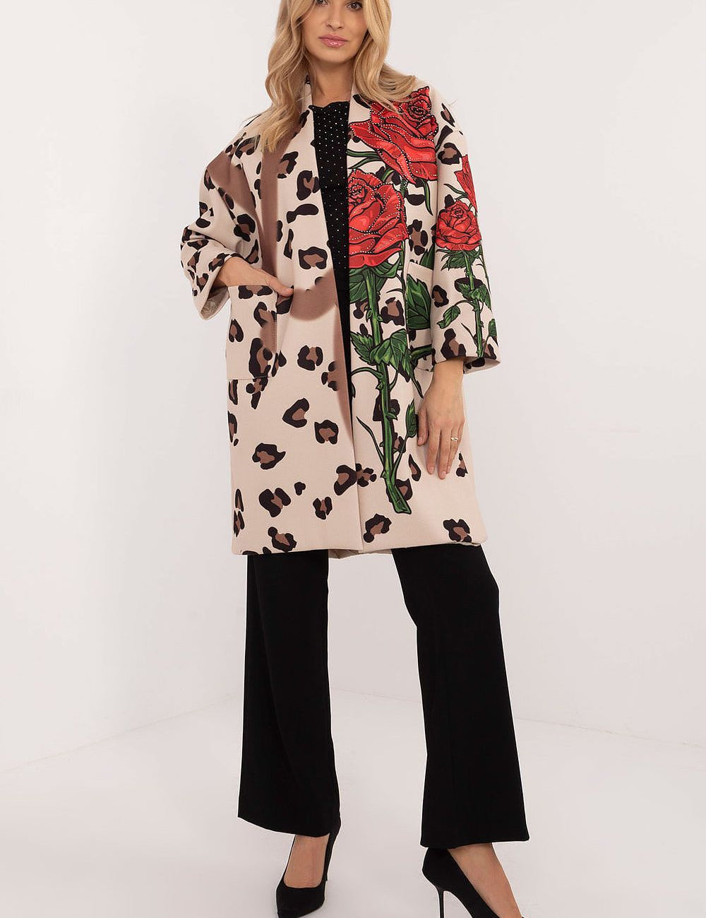 Woman wearing Florénne Rhinestone Rose Coat with rose print and rhinestone accents, showcasing lightweight elegance for transitional seasons.