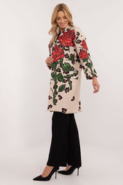 Woman wearing Florénne Rhinestone Rose Coat with stemmed rose print and rhinestone accents, styled for a chic and elegant look.