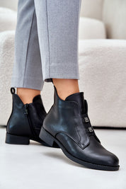 Woman wearing Dovarya Flat Eco Leather Boots with side zipper and decorative accents, perfect for cold weather comfort and style.