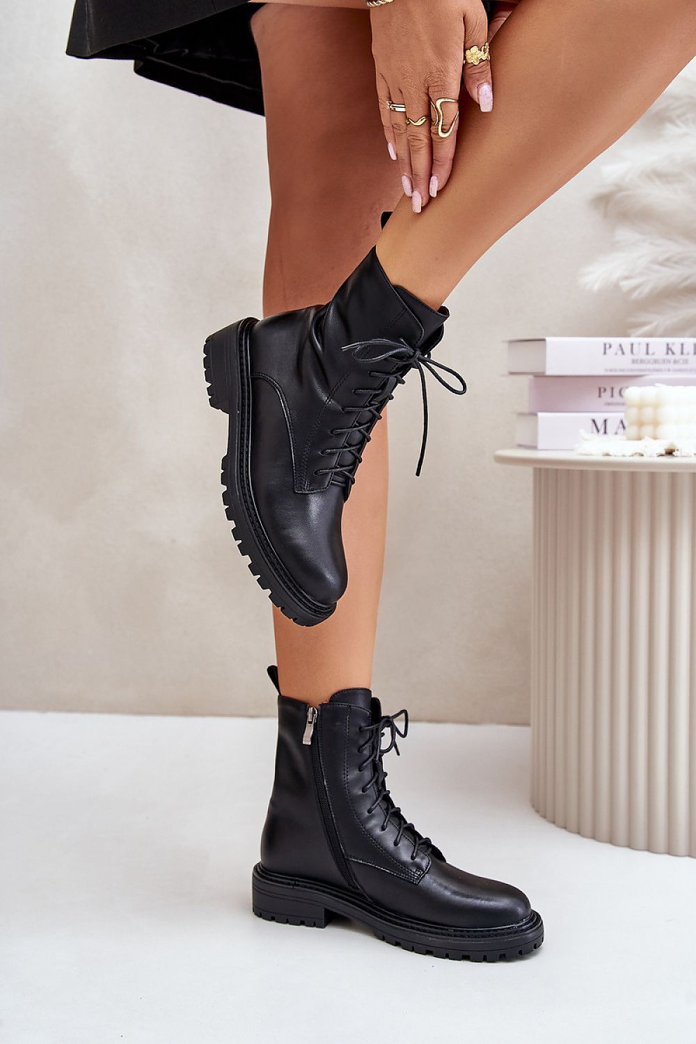 Arvenna Insulated Everyday Boots in black leather with classic lacing and side zipper, ideal for urban winters and casual outings.