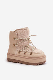 Glavira fur-lined platform snow boot with thick faux fur lining, laced upper, and synthetic fur trim for warmth and charm.