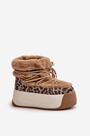 Velmara fur-lined snow boots with leopard print, natural leather, high-grip platform sole, and cozy fur interior for winter comfort.
