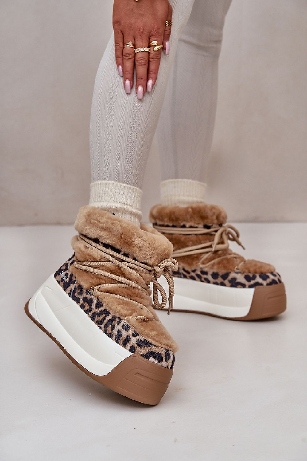 Velmara Fur-Lined Snow Boots with leopard print design, featuring cozy fur trim and high-grip sole for winter comfort and style.