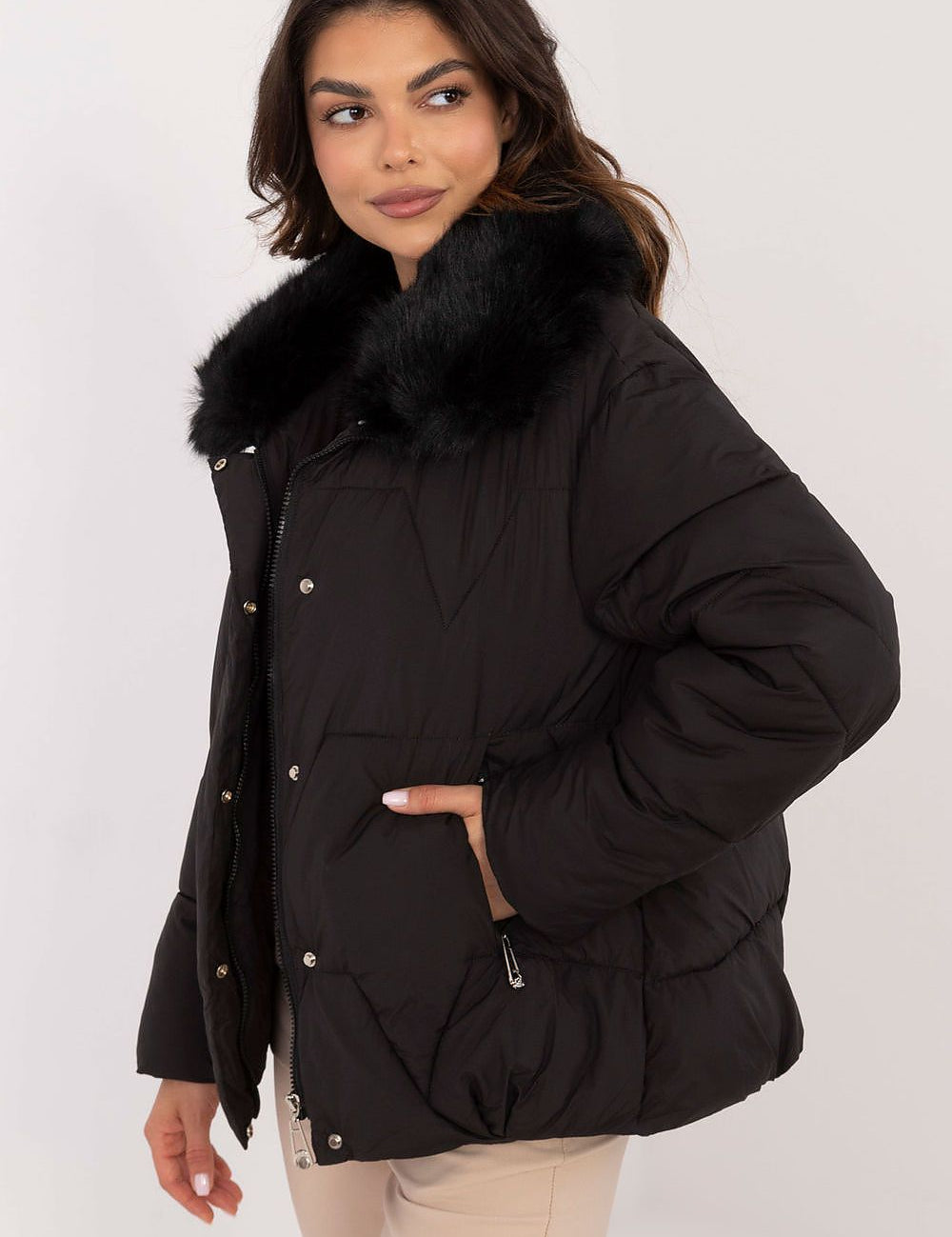 Merivane quilted jacket with fur collar, showcasing elegant design and warm fit, ideal for cold-weather style.