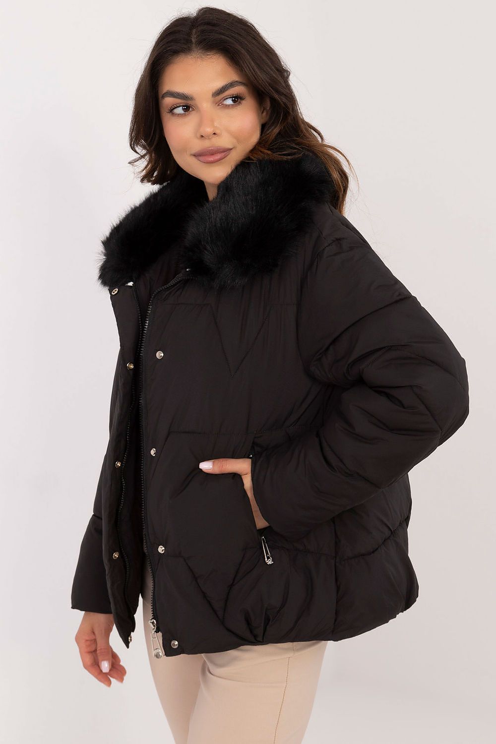 Merivane quilted jacket with fur collar, showcasing elegant design and warm fit, ideal for cold-weather style.