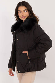 Merivane quilted jacket with fur collar, showcasing elegant design and warm fit, ideal for cold-weather style.