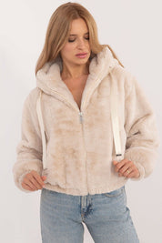 Woman wearing Althevia Hooded Viscose Jacket with zip closure and long sleeves in off-white, ideal for autumn layering.