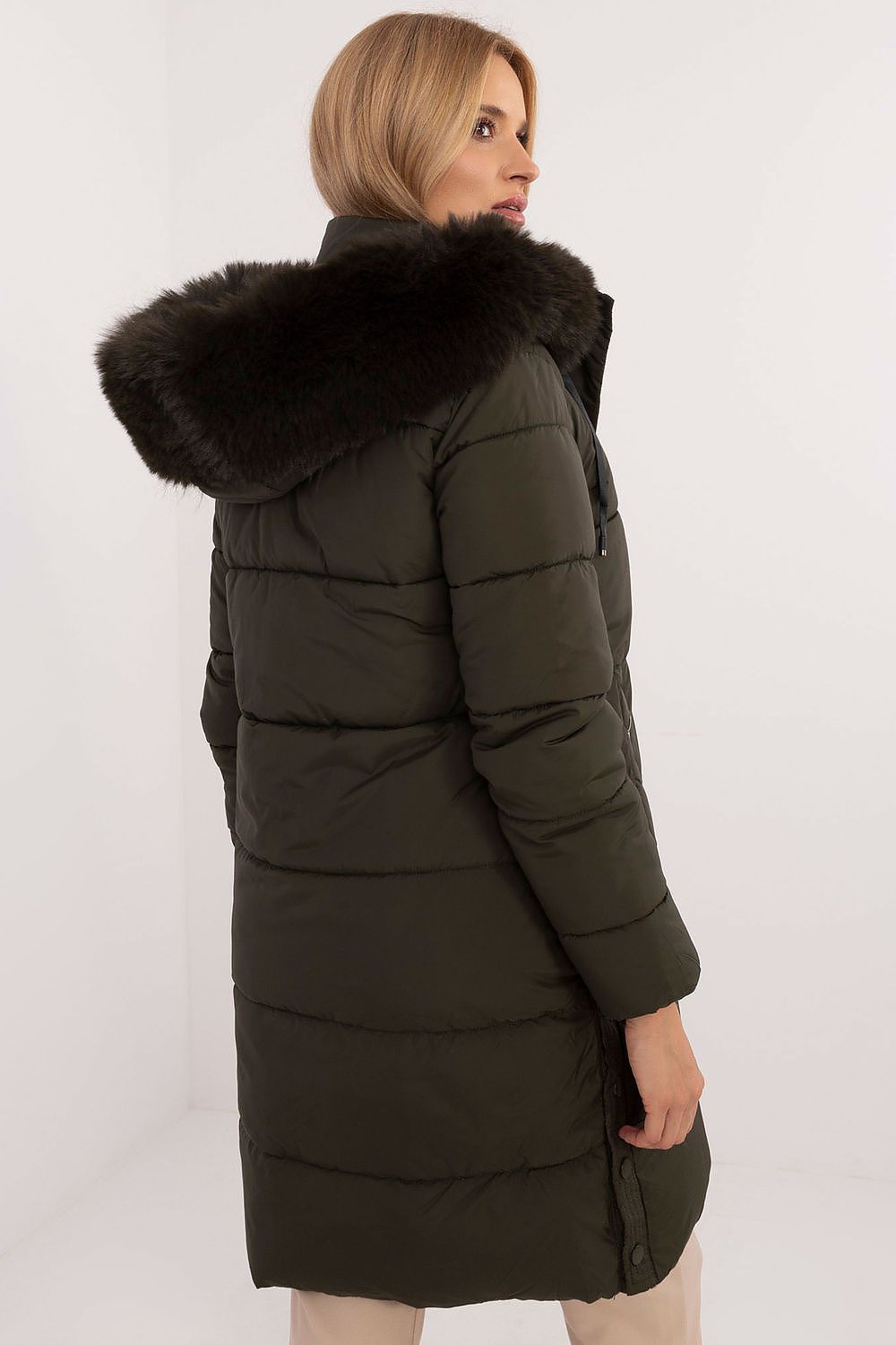Model wearing Arden Quilted Longline Winter Jacket with detachable fur-trimmed hood, perfect for autumn and winter insulation.