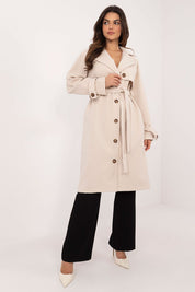 Meriselle Belted Weather-Resistant Trench Coat on model, knee-length, durable polyester, button closure, side pockets, waist belt.