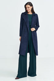Woman wearing Aurivanne Nubuck Trench Coat with long sleeves, button closure, and shoulder epaulettes for elegant and warm style.