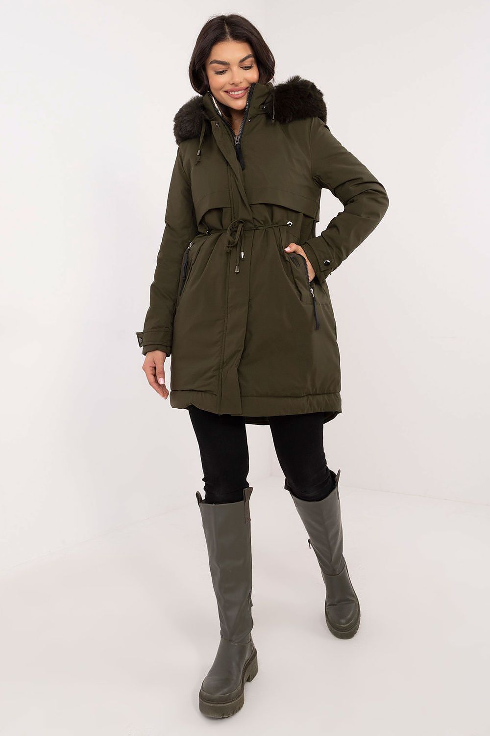 Woman wearing Frostveil Quilted Winter Jacket with faux fur trim and removable hood, showcasing modern style and practical warmth.