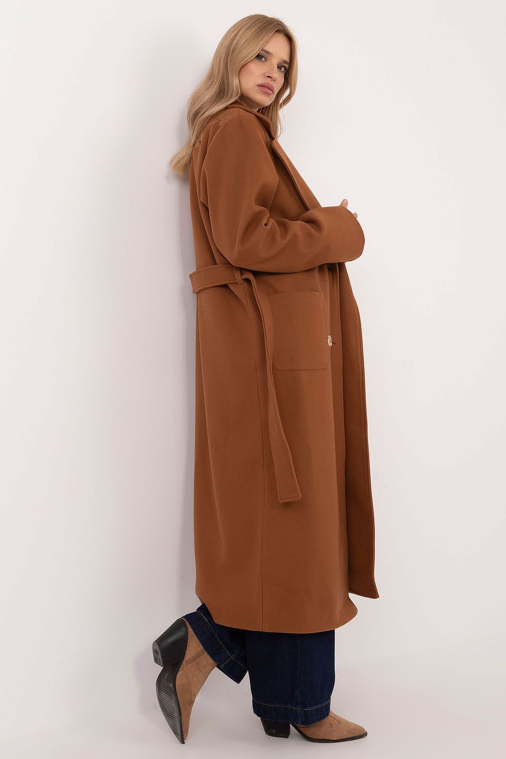 Woman wearing Olivanne Long Wool Blend Coat with wide lapels and waist tie, showcasing elegant autumn to spring fashion.