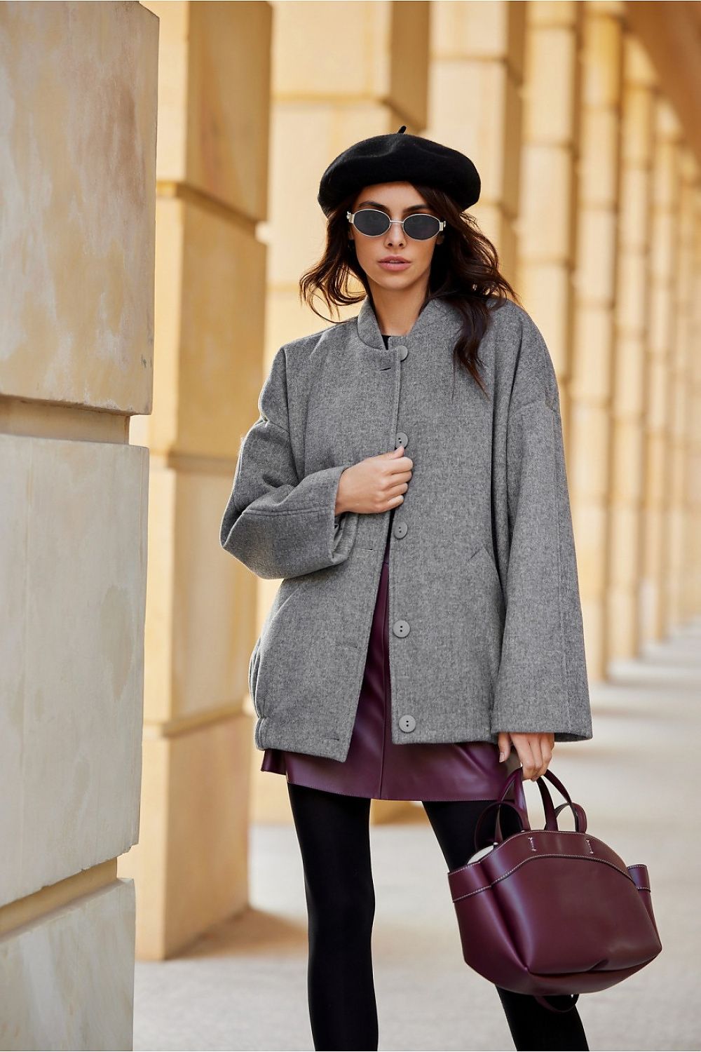 Woman wearing Vernelle Stand-Collar Buttoned Jacket with beret and sunglasses, showcasing elegant and relaxed style in urban setting.