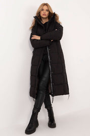 Woman wearing Aurivelle Long Hooded Winter Coat, black, with windproof hood and warm synthetic filling, perfect for autumn and winter.