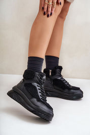 Valmara Shearling High-Top Sneakers with faux sheepskin trim, platform sole, lace and zipper closure, and cozy blanket lining.
