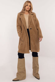 Woman wearing Elantra Pre-Knee Winter Coat, showcasing elegant and versatile design for autumn and winter wear.