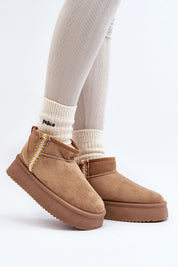 Azmira Aztec Platform Snow Boots on feet, featuring eco suede, plush fur lining, and Aztec pattern, perfect for winter citywear.