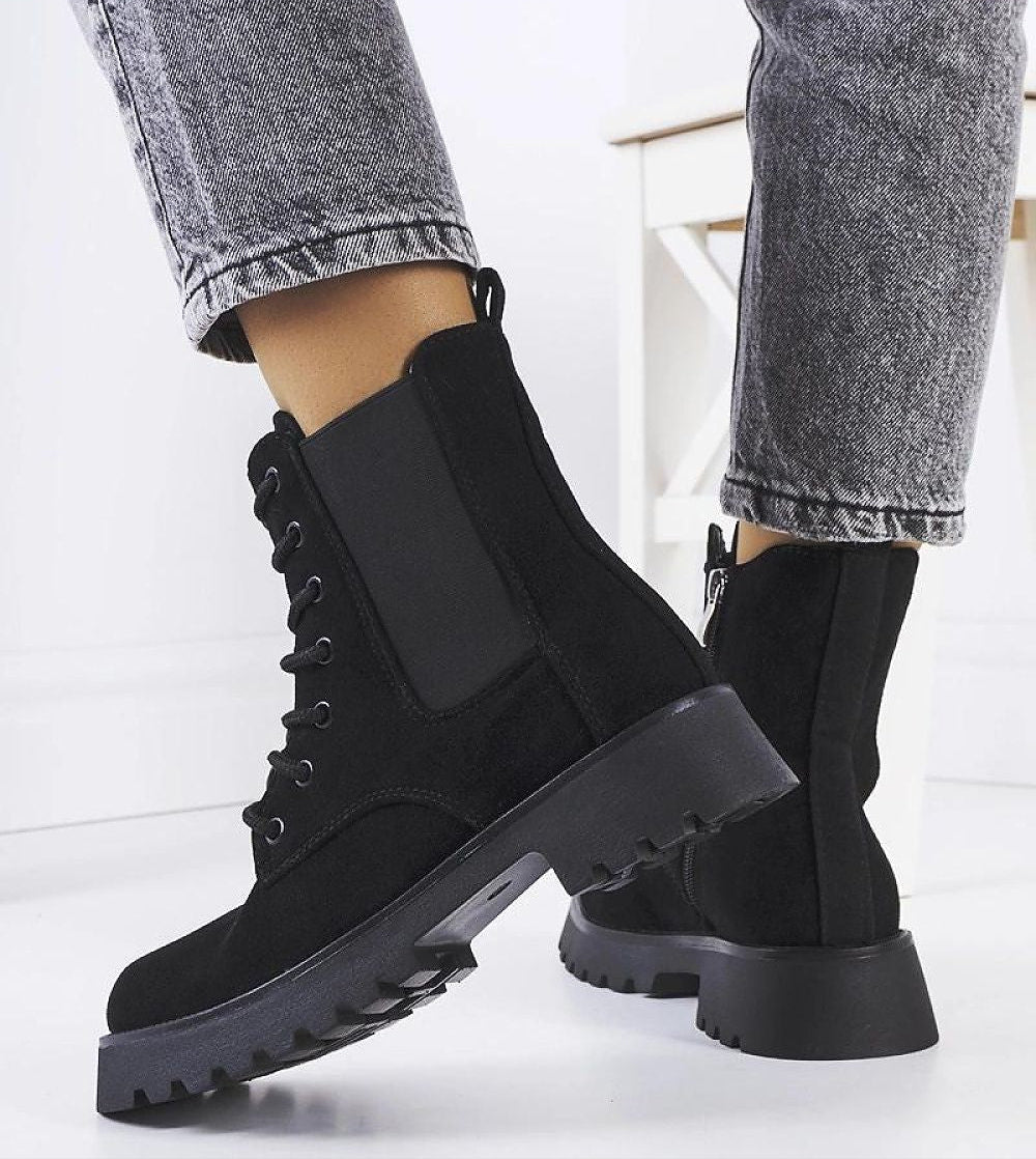 Everleigh Ridge Winter Boots with chunky sole and side zipper in black eco-leather, ideal for cold weather style and comfort.