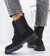 Everleigh Ridge Winter Boots with chunky sole and side zipper in black eco-leather, ideal for cold weather style and comfort.