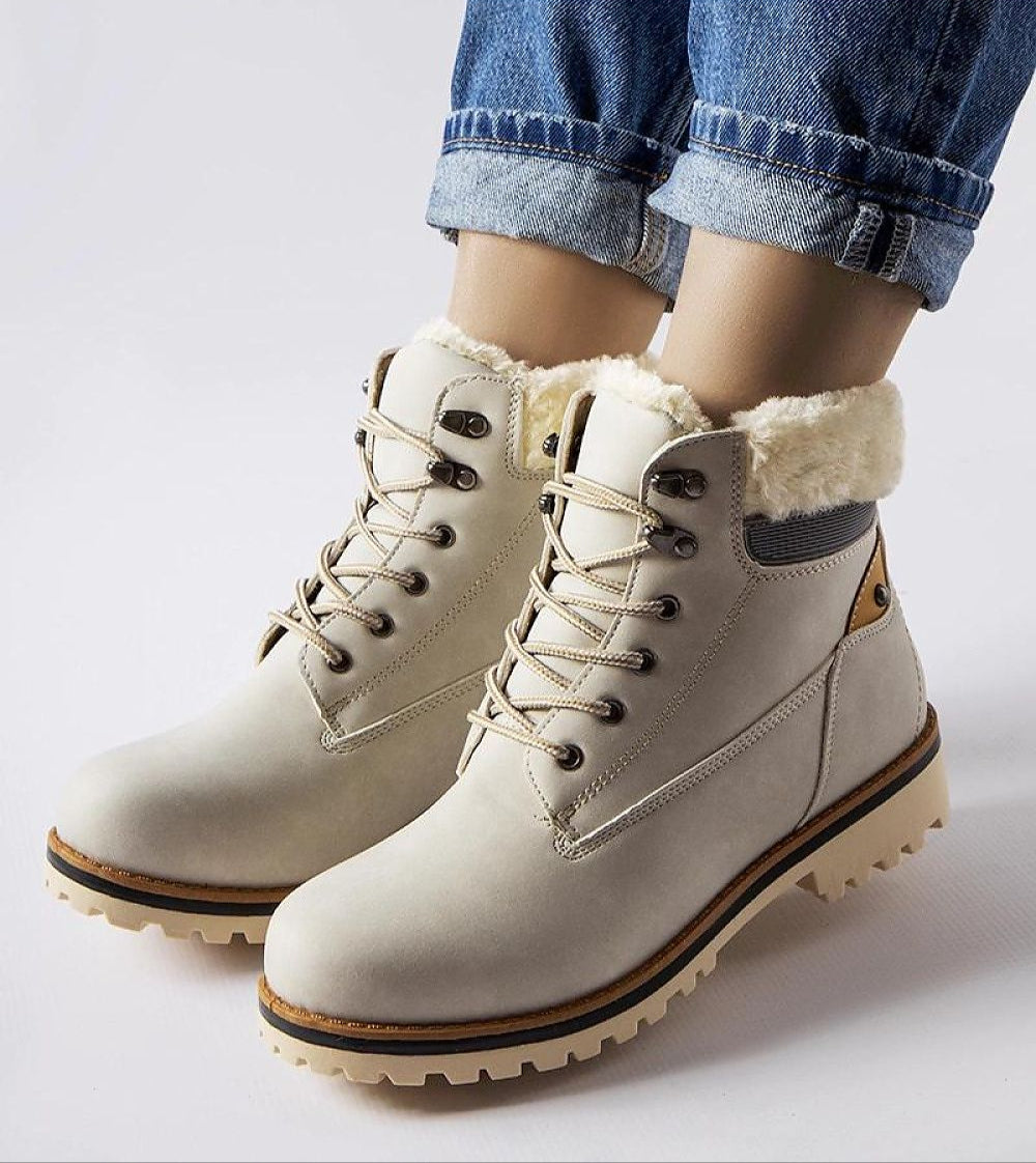 Montalbino Insulated Winter Trappers, ankle-height boots with fur lining, lace-up front, and flat sole for warmth and comfort.