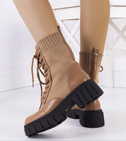 Braveda Brown Elastic-Top Boots with lace-up design and black treaded sole, showcasing eco leather and snug fit for autumn style.
