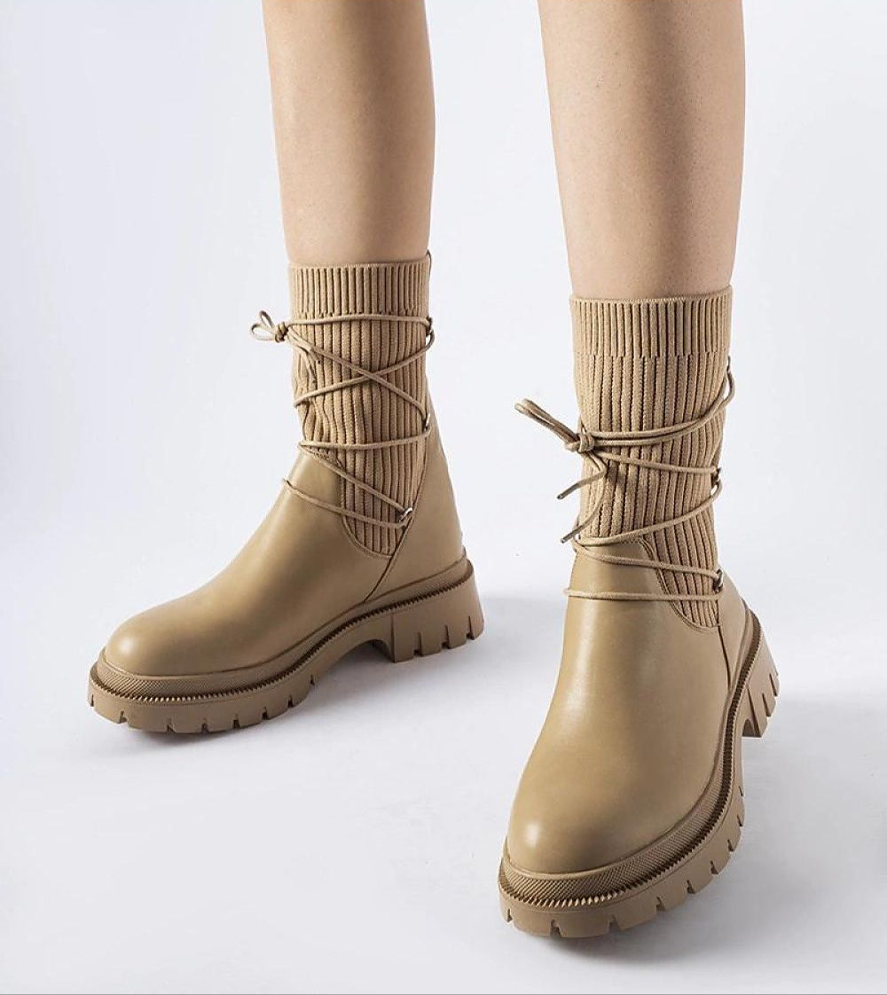Calmira Beige Sock Boots with round toe, sculpted sole, and 5.5 cm heel. Insulated slip-on design perfect for city streets or weekends.