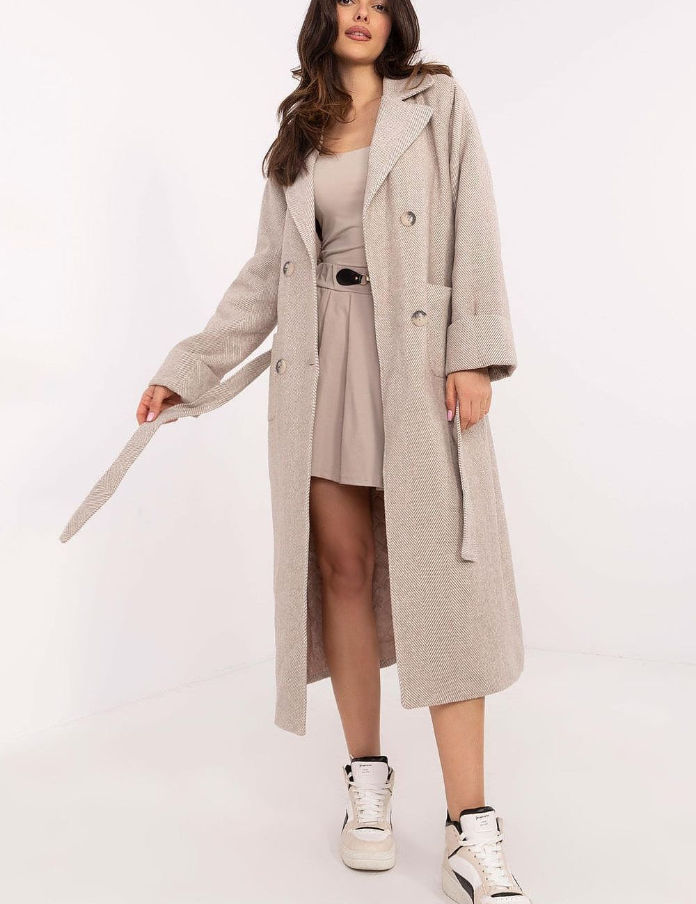 Woman wearing Selvarane Long Double-Breasted Wool Coat with belt, showcasing a stylish and elegant look.