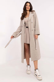 Woman wearing Selvarane Long Double-Breasted Wool Coat with belt, showcasing a stylish and elegant look.