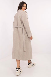 Women's Selvarane long double-breasted wool coat with belted waist, shown from the back, highlighting fine stripe pattern and quilted lining.
