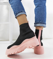 Black and pink Velaria slip-on sneakers with bold design, contrasting textile upper and pink sole, perfect for summer style and comfort.