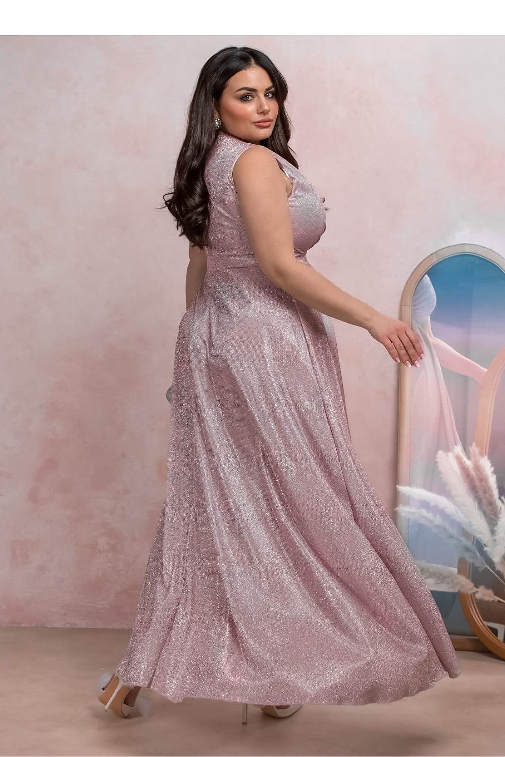 Auravelle Plus Size Evening Dress in muted blush, wrap-style V-neck, adjustable tie waist, flared skirt with high slit for weddings and galas