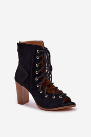 Rinella Block Heel Lace Sandals in black eco suede with laced upper and zipper back, featuring a bold, stylish block heel.
